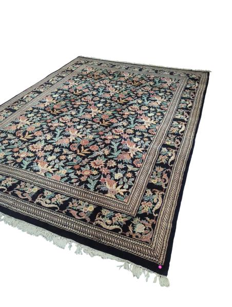 Black Floral Rug with Intricate Border and Fringe