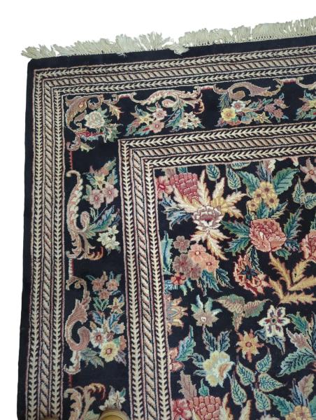 Black Floral Rug with Intricate Border and Fringe