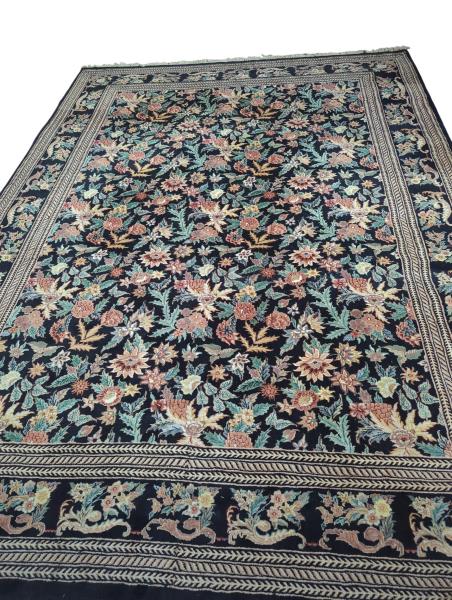 Black Floral Rug with Intricate Border and Fringe