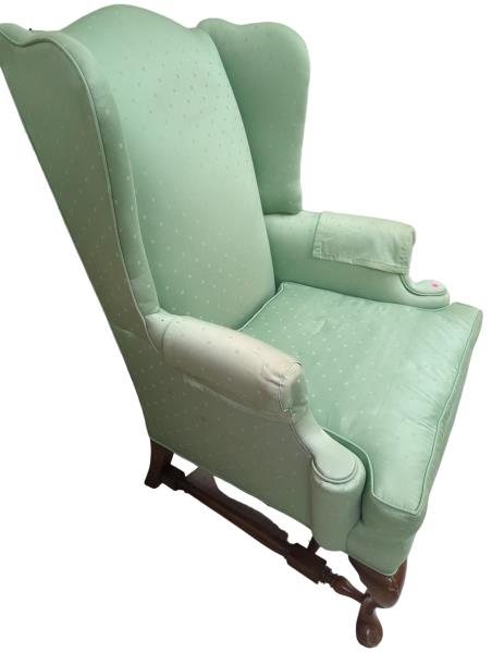 Green Wingback Chair with Wooden Legs and Pink Sticker - Cozy Club Chair with Unique Design